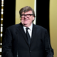 Illustration for article titled Filmmaker Michael Moore Wants America’s Favorite Black Woman to Save America From Trump
